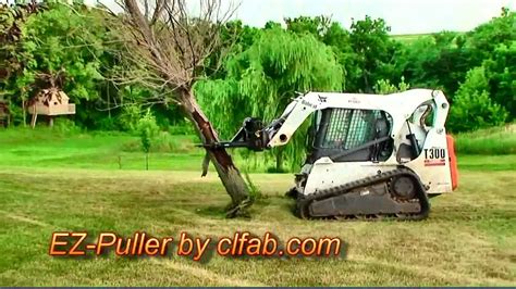 skid steer tree puller youtube|skid steer tree puller reviews.